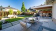 © Shozib - Backyard with swimming pool, outdoor kitchen, and patio furniture enjoying summer day