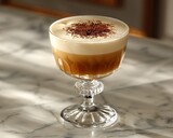 Delicious irish coffee elegantly served on a luxurious marble table for a cozy experience.