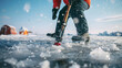 © Jafree - Angler Using Ice Auger to Drill a Hole in Frozen Lake. Concept of Winter Ice Fishing, Outdoor Adventure, Arctic Survival