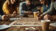 © Rossarin - A diverse group of professionals collaborates over charts and coffee, focusing on strategy and data analysis in a cozy workspace.