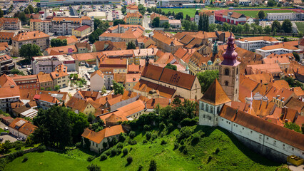 Aerial drone view of Ptuj townscape in Slovenia by river Drava