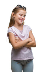 Young beautiful girl wearing sunglasses over isolated background happy face smiling with crossed arms looking at the camera. Positive person.