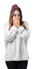 Wall Mural - Young beautiful brunette hipster woman wearing sunglasses over isolated background shocked covering mouth with hands for mistake. Secret concept.