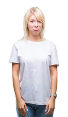 Poster - Young beautiful blonde woman wearing white t-shirt over isolated background depressed and worry for distress, crying angry and afraid. Sad expression.