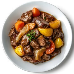 Wall Mural - Savory beef stew with potatoes and vegetables on white plate