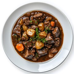 Wall Mural - Delicious homemade beef stew with vegetables in a white bowl