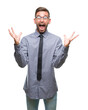 © Krakenimages.com - Young handsome business man over isolated background celebrating crazy and amazed for success with arms raised and open eyes screaming excited. Winner concept