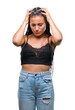 © Krakenimages.com - Young braided hair african american with pigmentation blemish birth mark over isolated background suffering from headache desperate and stressed because pain and migraine. Hands on head.