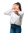 © Krakenimages.com - Young braided hair african american girl wearing winter sweater over isolated background covering eyes with hands and doing stop gesture with sad and fear expression. Embarrassed and negative concept.