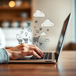 © dapra01 - Hand Using Laptop with Online Shopping Sketch Art and Floating Cloud Computing, Blurred Background