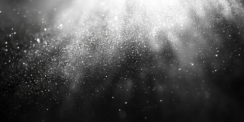 Sticker - Sparkling silver glitter scattered on a black background.