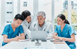 © CourtH/peopleimages.com - Medical group, laptop and planning in meeting for healthcare discussion, problem solving or training interns. Computer, hospital and team of doctors with nurses and mature mentor for schedule update