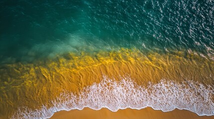  A birds-eye perspective of a beach showcases crashing waves and a yellow line marked on its shoreline