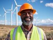© SnapNest - Smiling engineer in reflective vest, backdrop of wind turbines and blue skies, clean energy celebration with realistic photo and captured with Canon EOS 5D Mark IV, 125mm lens