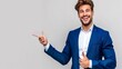 © Diana - Smiling man in a blue suit giving a thumbs up and pointing on a light gray background during a professional photo session