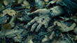 © Domingo - A close-up of a dirty, injured hand of a person lying lifeless among fallen leaves on the forest floor. The cold, muted tones and disturbed dirt suggest a crime scene, evoking a sense of tragedy.