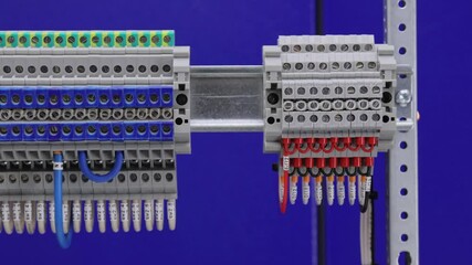 Poster - Electrical screw through terminals with connected insulated copper wires with tips.