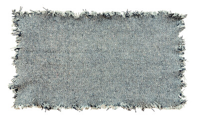 piece of torn denim on a white background. denim texture