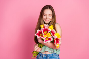 Sticker - Portrait of pretty young girl fresh flowers empty space wear top isolated on pink color background