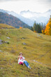 © famveldman - Family with kids hiking in the mountains