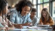 © mirifadapt - Teacher helping students with homework