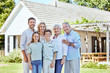 © Flashizzle/peopleimages.com - Portrait, happy big family and outdoor by house together for support, bonding or love. Smile, mother and father with children, grandparents and generations of people with siblings in backyard of home