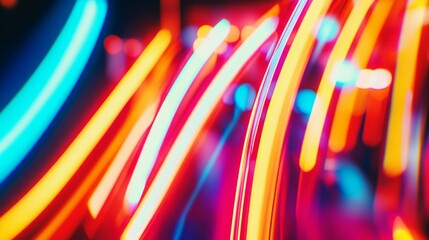 Poster - Bright neon lights twist and flow into mesmerizing abstract shapes, illuminating the urban landscape with vivid colors after sunset. The dynamic glow creates an electric atmosphere