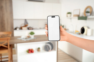 Sticker - Woman with blank mobile phone in kitchen, closeup