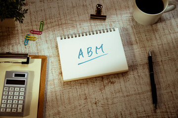 Wall Mural - There is word card with the word ABM. It is an abbreviation for Account Based Marketing as eye-catching image.