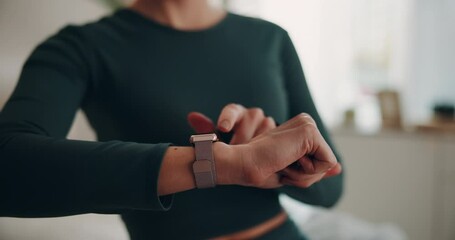 Wall Mural - Hands, woman and house with digital watch on checking time or tracking health for progress . Female person, closeup and fitness app on yoga for exercise and workout in living room for self care