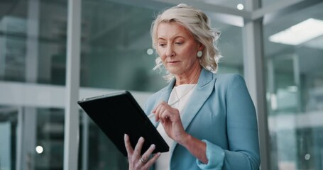 Poster - Mature, business woman or research with tablet at office for communication, network or connectivity. Female person, analyst or employee reading or working on technology for online report at workplace