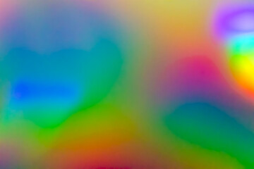 Abstract blur holographic rainbow foil iridescent background