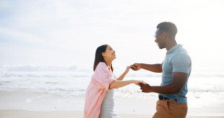 Poster - Couple, dance and beach for vacation, love and bonding together with happiness, energy and romance. Interracial, seaside and man with woman, movement and relationship with getaway trip and travel