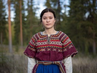 Wall Mural - Portrait of a Sami woman in traditional gákti dress, Scandinavia