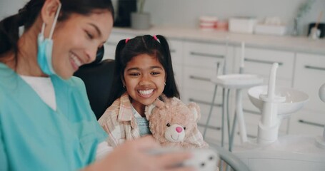 Canvas Print - Dentist, child or smile in clinic for selfie, support or ready for procedure. Oral care, kid and happy with orthodontist for trust, teddy bear or photography for dental portfolio or social media site