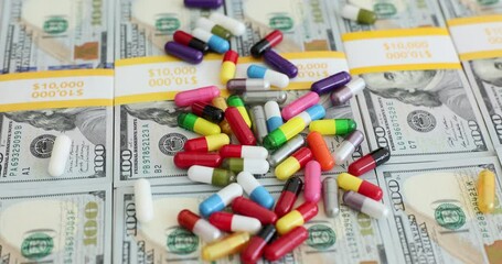 Wall Mural - Doctor and a lot of colorful capsules with stacks of money financial aspect of pharmaceutical industry