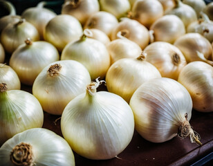 A variety of fresh, large white onions are neatly arranged on a supermarket counter, showcasing their shiny, white skin and inviting shoppers to select them for cooking or meals. Generative AI