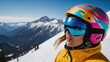 © Nemanja - Skier woman wearing a colorful ski helmet and goggles stands on a snowy mountain