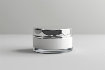 Wall Mural - A glass jar with a silver lid sits on a table, great for still life photography or product shots