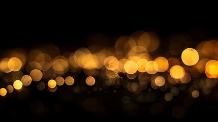 Wall Mural - golden abstract bokeh lights on black background: festive holiday atmosphere and elegant sparkling d