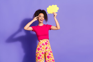 Wall Mural - Photo of cheerful pretty lady dressed pink t-shirt speaking bubble empty space isolated purple color background