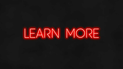 Wall Mural - Learn More red neon lettering on plain black dark background