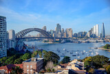 Sydney cityscape, harbour bridge, boats, skyscraper highrise CBD, water blue sky day daylight daytime, international travel tourism destination Australia