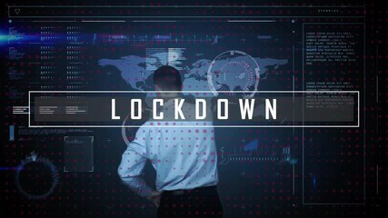 Sticker - Animation of lockdown text over caucasian businessman using digital screen