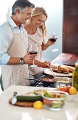 Canvas Print - Married couple, food and wine with cooking, love or laugh for bonding together in kitchen. Mature man, happy woman and affection with helping, healthy meal and nutrition in preparing dinner at home