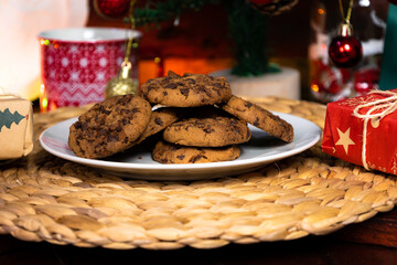 freshly baked christmas cookies on a plate on christmas eve, christmas food and celebration concept