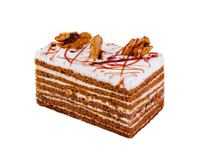 Wall Mural - Delicious cake with walnuts and caramel drizzled on top isolated on white background