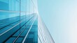 © BozStock - An abstract view of a tall glass building reaching for the sky.