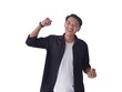 © Rmd17 - Excited young handsome Asian man celebrating success with raised fists isolated on white background