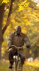 Poster - A man is riding a bicycle in a park